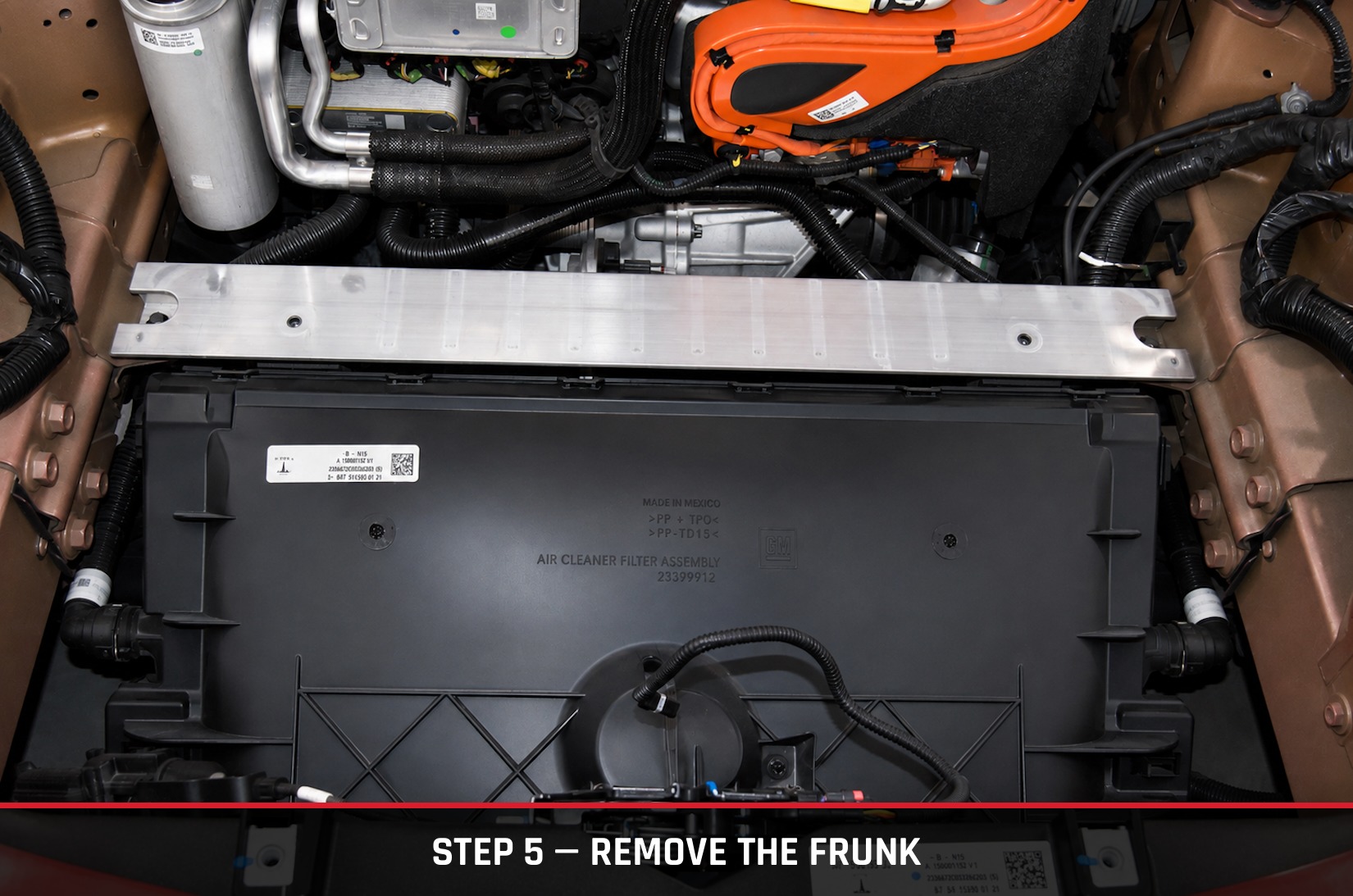 Tesla Model Y front trunk area with the radiator and condenser exposed