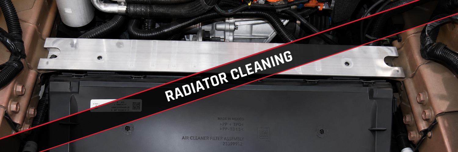 Tesla Model Y front trunk area with the radiator and condenser exposed