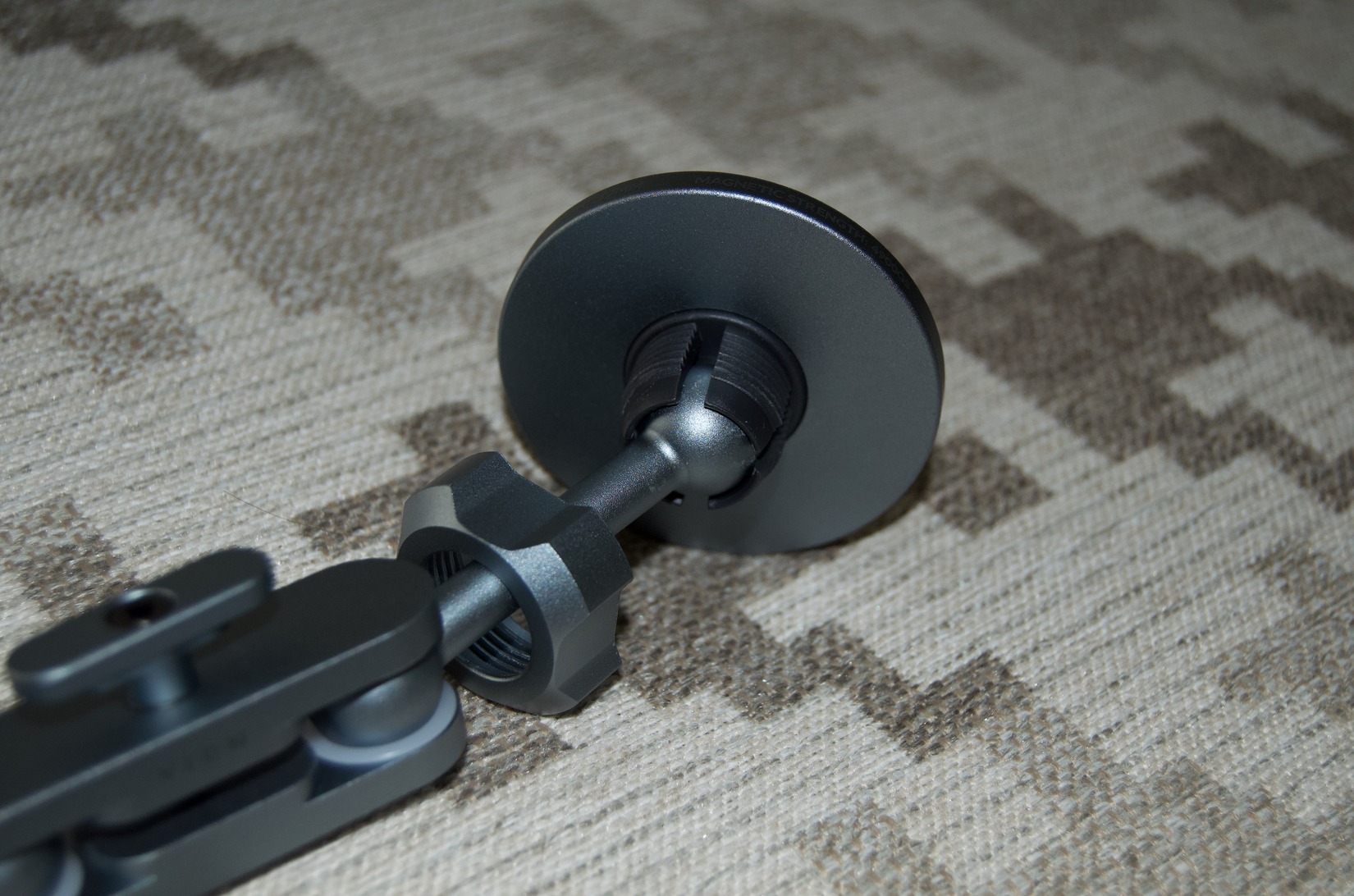 VION mount arm assembled with the nut and ball joint tightened into the magnetic holder base