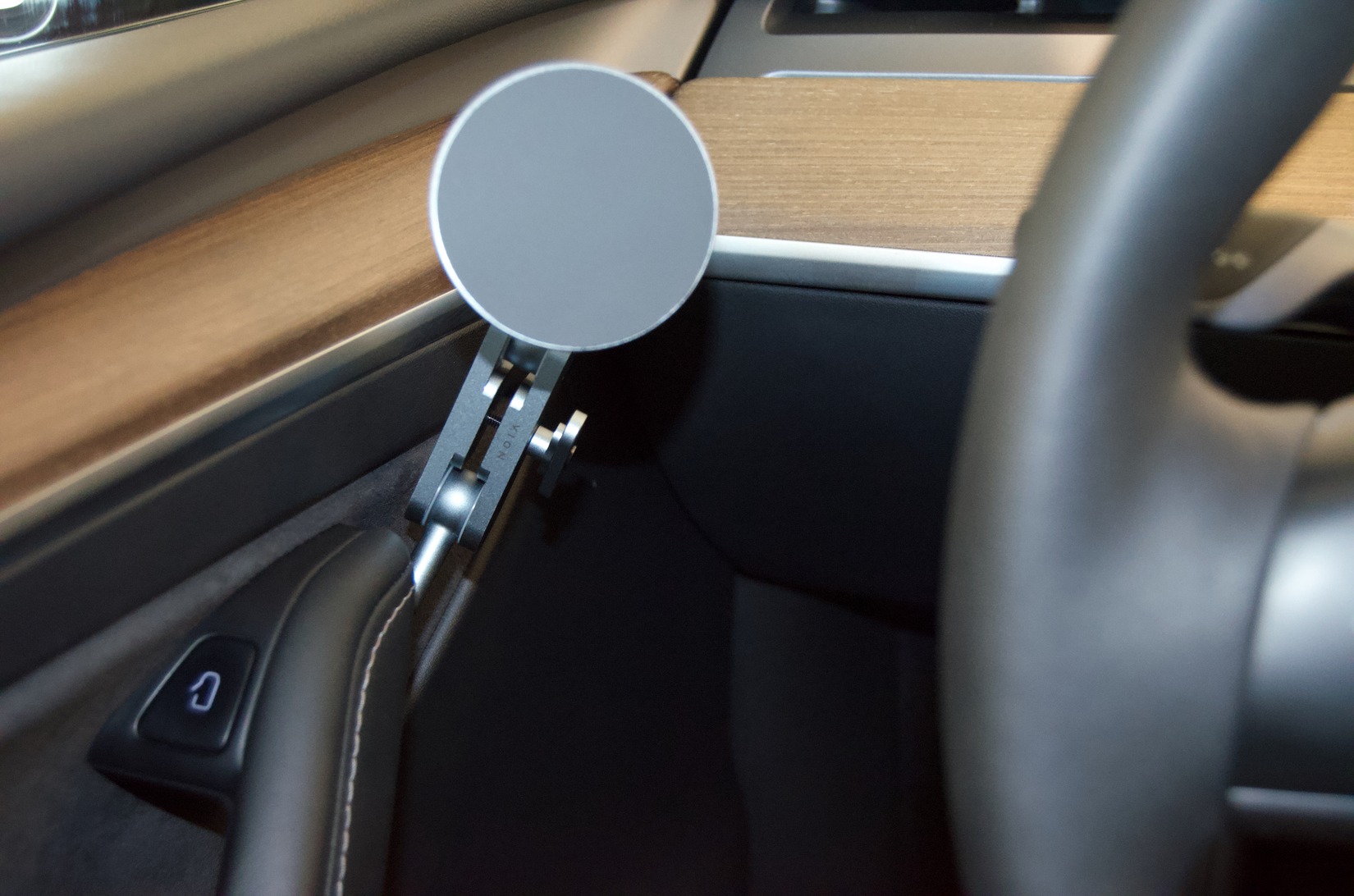 VION Magnetic Phone Mount positioned and tightened near the steering wheel